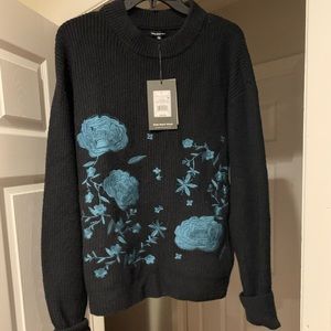 Never worn black sweater with beautiful blue floral design. Who What Wear. XL